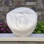 Round White Kufi Hat Top View - Traditional Geometric Design of Firoz Topi.